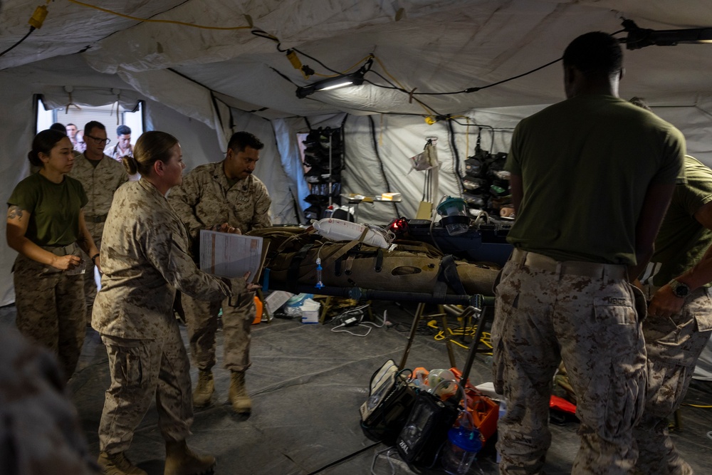 11th MEU Sailors aid a simulated casualty during RUT