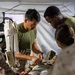 11th MEU Sailors aid a simulated casualty during RUT