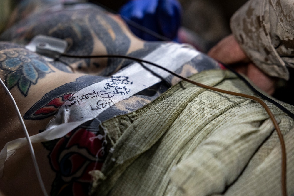 11th MEU Sailors aid a simulated casualty during RUT