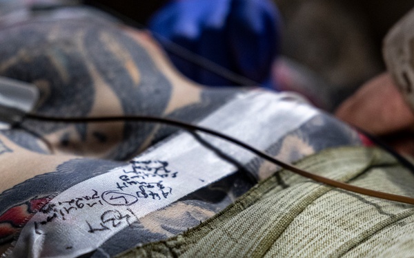 11th MEU Sailors aid a simulated casualty during RUT