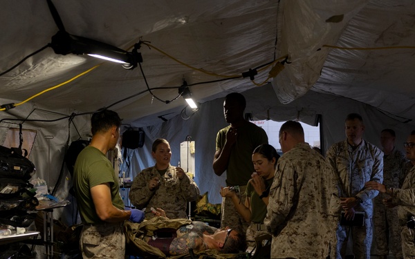 11th MEU Sailors aid a simulated casualty during RUT