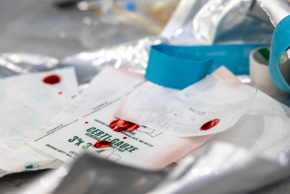 11th MEU Sailors aid a simulated casualty during RUT