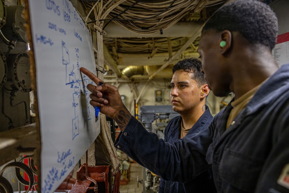 USS Iwo Jima Sailors Maintain The Engineering Pit