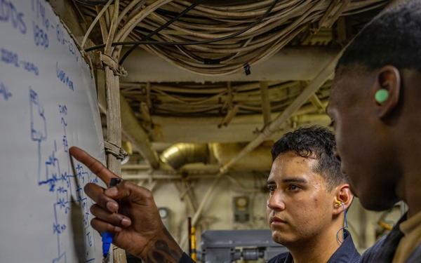 USS Iwo Jima Sailors Maintain The Engineering Pit