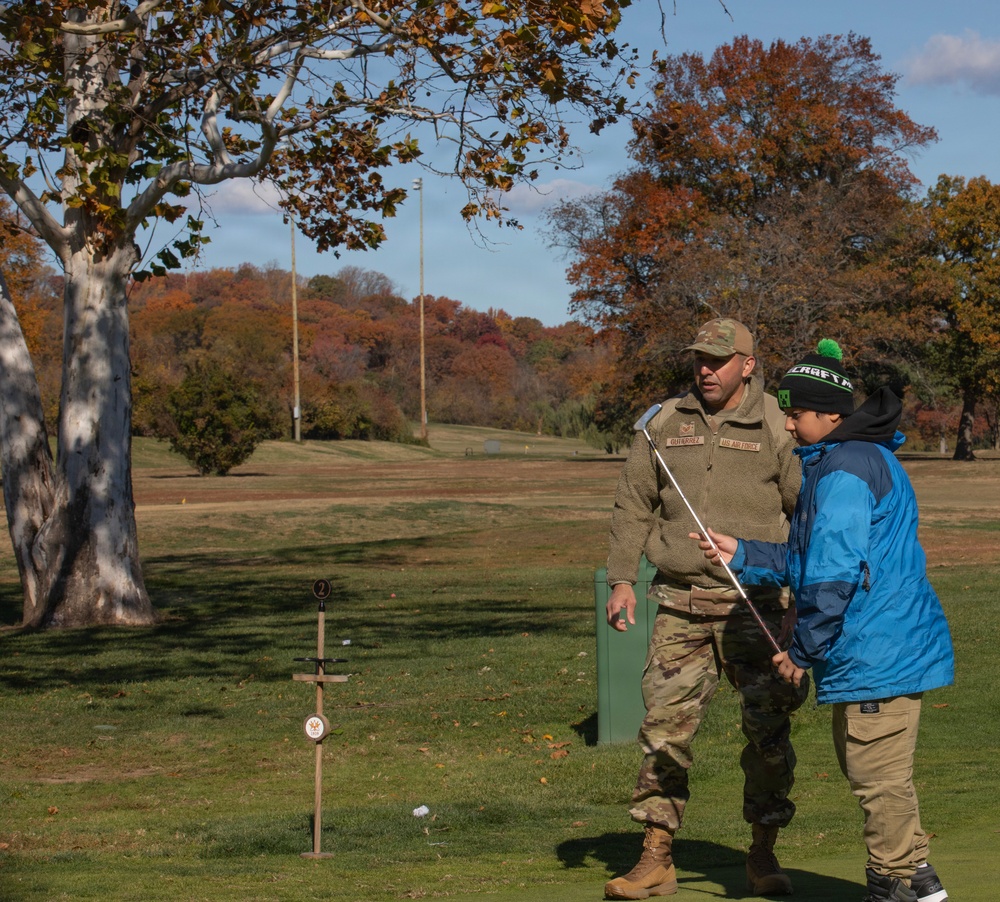 Airmen helps local golf course with Special Olympics program