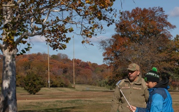 Airmen helps local golf course with Special Olympics program