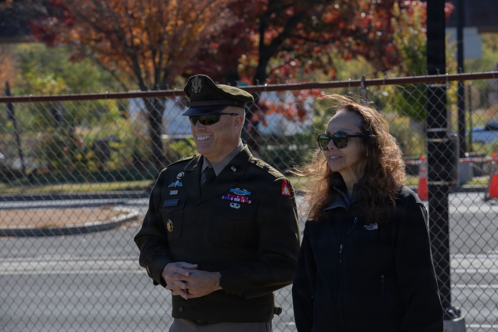 Brig. Gen. Leland D. Blanchard II speaks with local golf course volunteers