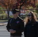 Brig. Gen. Leland D. Blanchard II speaks with local golf course volunteers