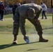 Airmen helps set up local golf course