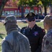 Brig. Gen. Leland D. Blanchard II speak with airmen at local golf course