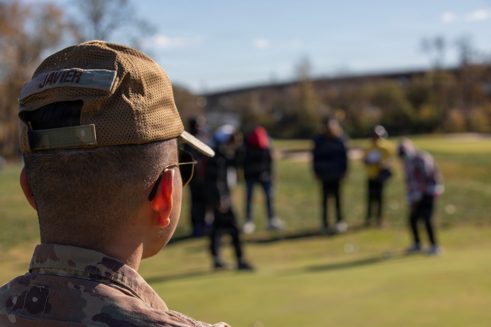 Airmen helps out local golf course with Special Olympics Program