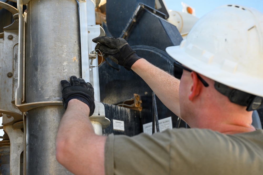 Keeping the mission flowing: WFSM Airmen tackle grease trap maintenance