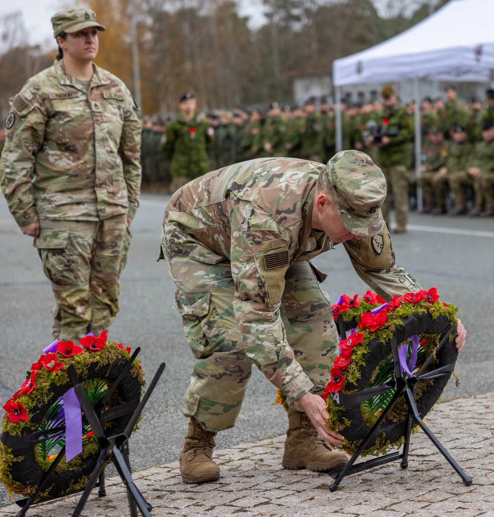 U.S. Army Soldiers prepare to lay a wreath next to other NATO countries’ wreaths