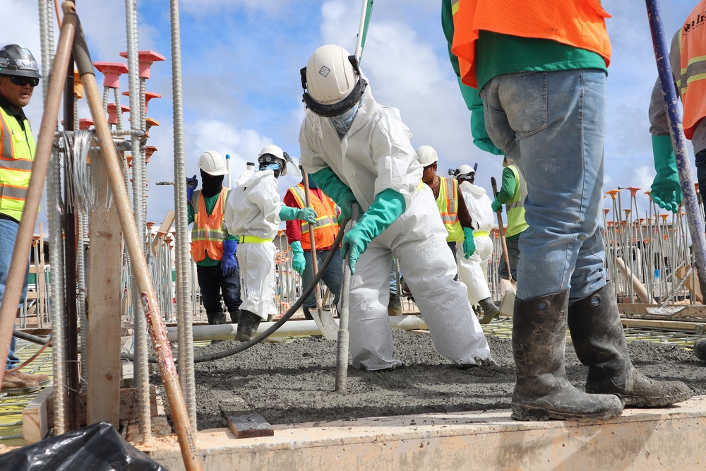 Construction Workers Vibrate a Fresh Pour of Concrete on Camp Blaz