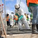 Construction Workers Vibrate a Fresh Pour of Concrete on Camp Blaz