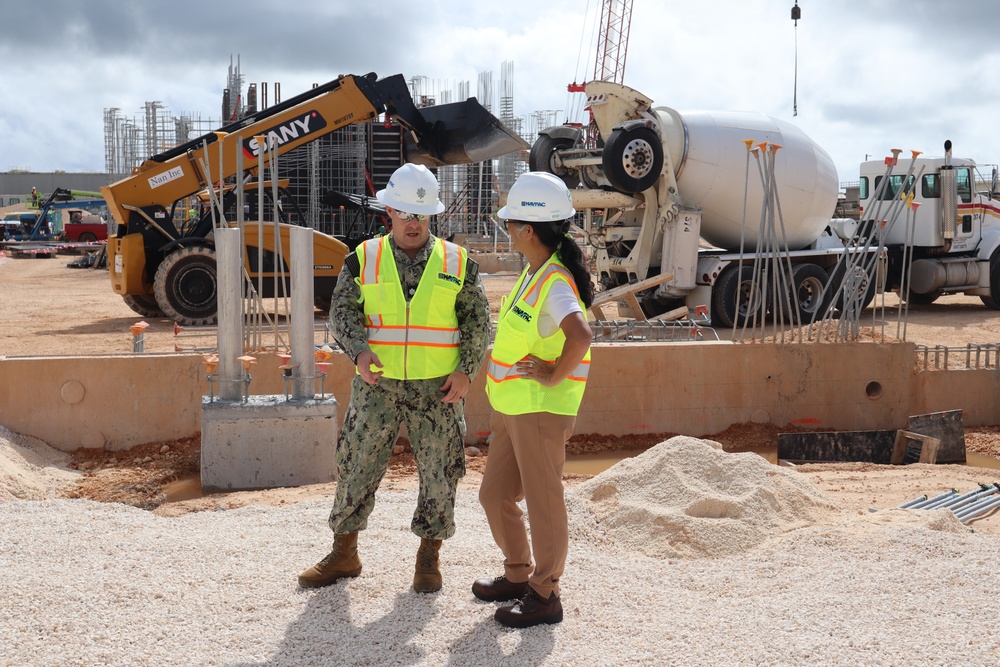 The Officer in Charge of Construction Discuss a Pending Concrete Pour
