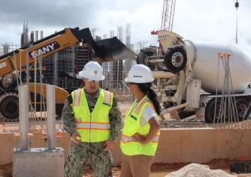 The Officer in Charge of Construction Discuss a Pending Concrete Pour