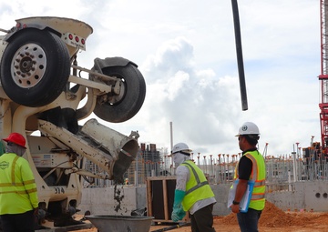 Contractors Conduct a Concrete Pour