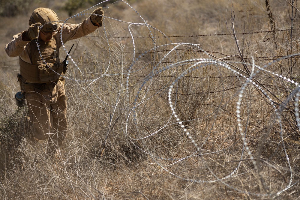 Marines reinforce barrier in mountainous region