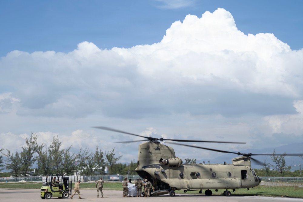 Joint Task Force-Bravo Load Shelter Supplies into CH-47 Chinook