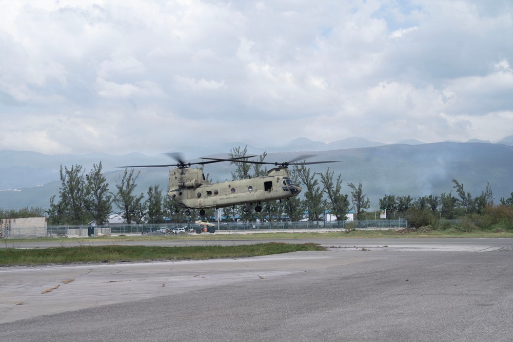 Joint Task Force-Bravo Load Shelter Supplies into CH-47 Chinook