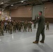Wing commander Col. Rusty Ballard briefs 182nd Airlift Wing on Combat Readiness Inspection (CRI) results Sept. 10, 2025