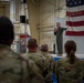 Wing commander Col. Rusty Ballard briefs 182nd Airlift Wing on Combat Readiness Inspection (CRI) results Sept. 10, 2025