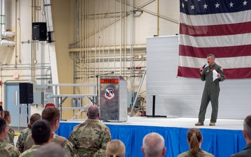 Wing commander Col. Rusty Ballard briefs 182nd Airlift Wing on Combat Readiness Inspection (CRI) results Sept. 10, 2025