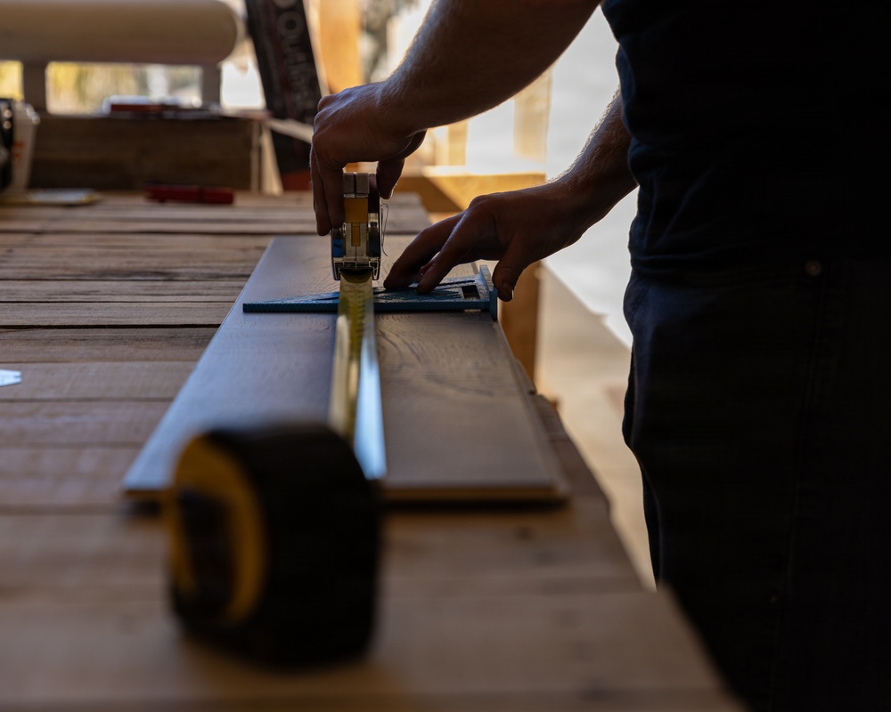 How Doers Get More Done: Marines with CLB-13 make barracks renovations with the help of the Home Depot Foundation volunteers