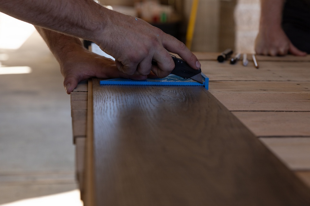 How Doers Get More Done: Marines with CLB-13 make barracks renovations with the help of the Home Depot Foundation volunteers