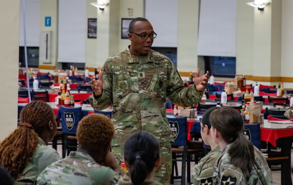 Champion Brigade junior Soldiers talk with Champion CSM