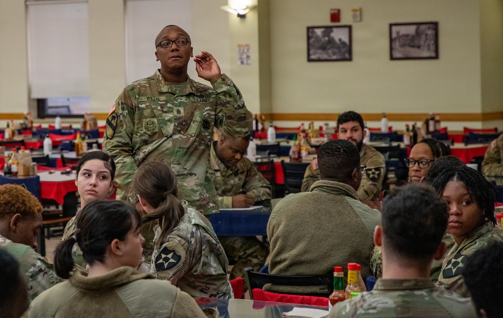Champion Brigade junior Soldiers talk with Champion CSM