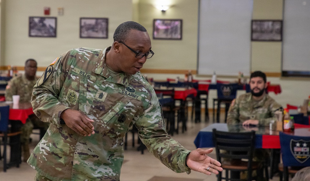 Champion Brigade junior Soldiers talk with Champion CSM