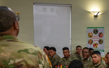 Champion Brigade junior Soldiers talk with Champion CSM