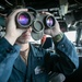 USS Mitscher (DDG 57) junior officer stands bridge watch