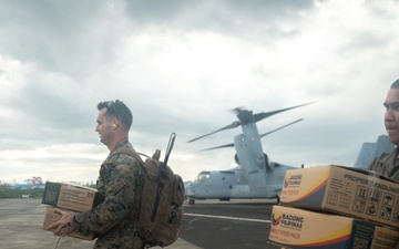 U.S. Marines Support Delivery of Family Food Packs in Philippines During Foreign Disaster Relief Operations
