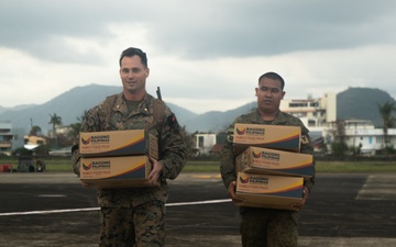 U.S. Marines Support Delivery of Family Food Packs in Philippines During Foreign Disaster Relief Operations