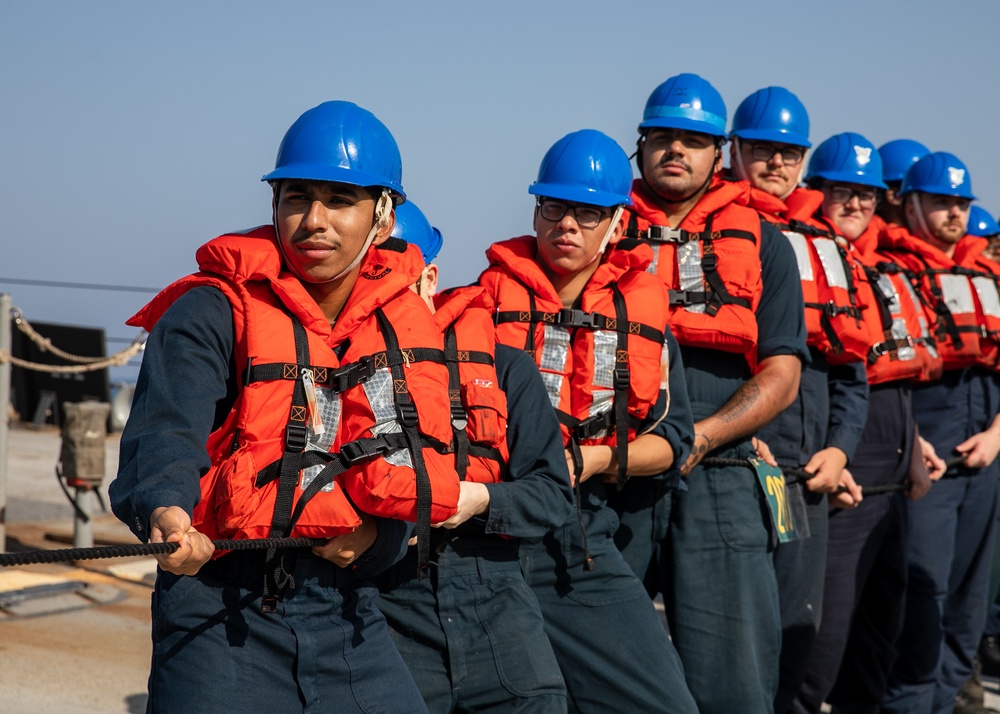 USS Mitscher (DDG 57) man phone and distance line during RAS