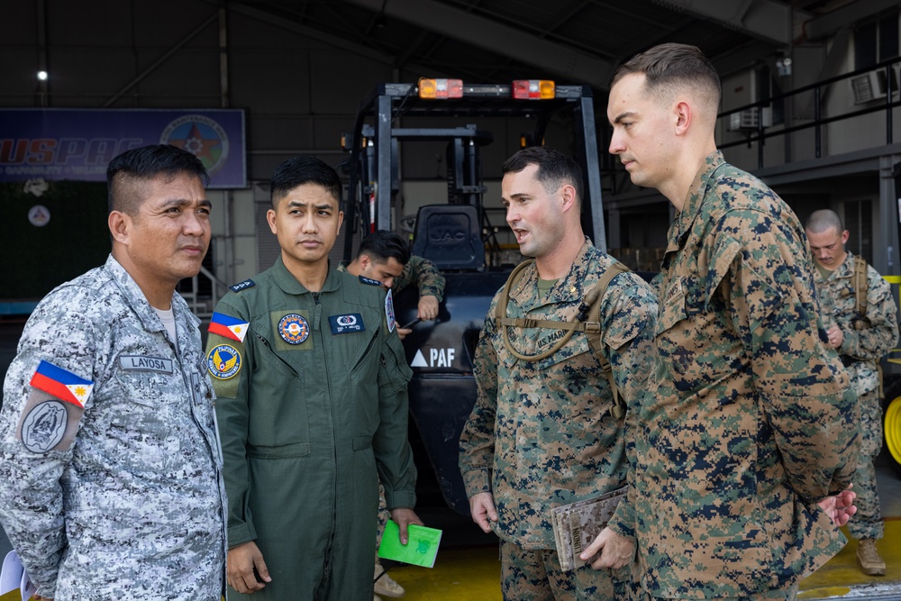 Philippine Armed Forces, U.S. Marines Prepare 10,000 Family Food Packs for Disaster Relief Operations following Super Typhoon Fung-Wong