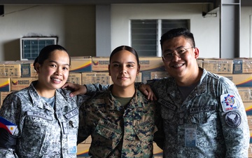 Philippine Armed Forces, U.S. Marines Prepare 10,000 Family Food Packs for Disaster Relief Operations following Super Typhoon Fung-Wong