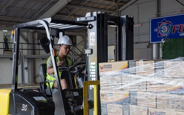 Philippine Armed Forces, U.S. Marines Prepare 10,000 Family Food Packs for Disaster Relief Operations following Super Typhoon Fung-Wong