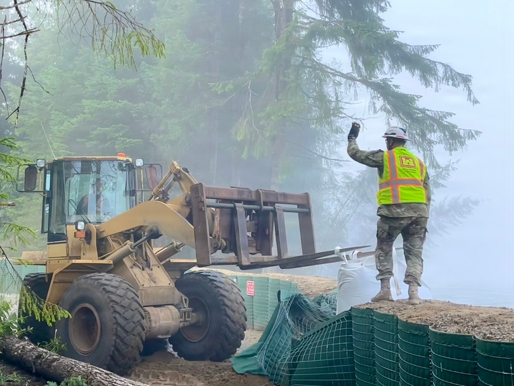 USACE staff assist in repairing temporary barriers during Juneau glacial lake outburst flood event