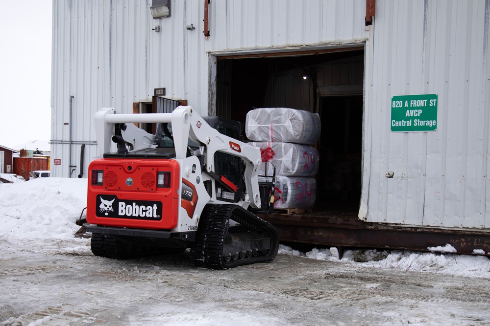AKOM members distribute building supplies during Operation Halong Response