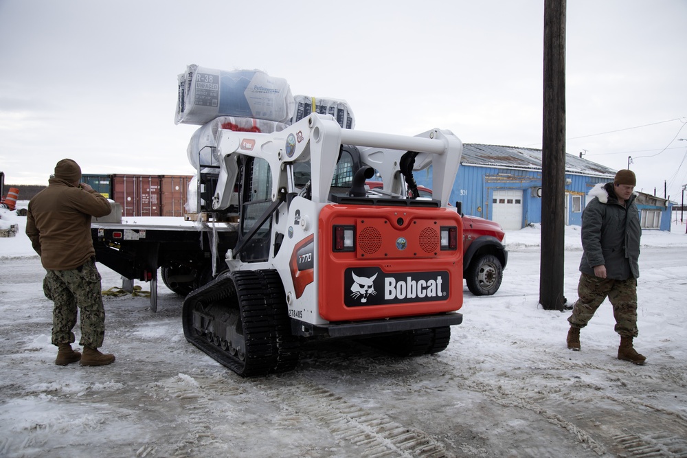 AKOM members distribute building supplies during Operation Halong Response