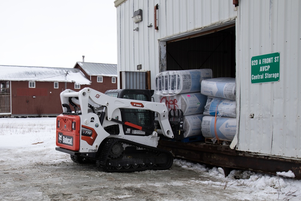 AKOM members distribute building supplies during Operation Halong Response