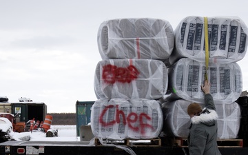 AKOM members distribute building supplies during Operation Halong Response
