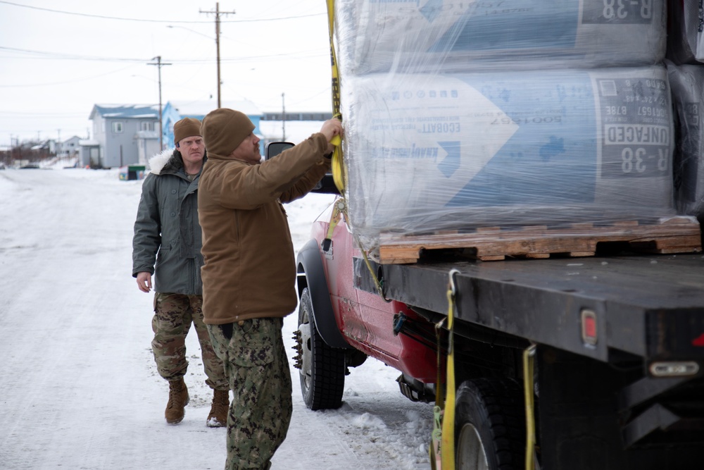 AKOM members distribute building supplies during Operation Halong Response