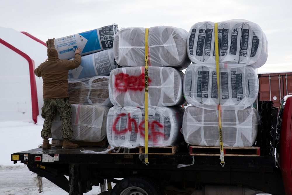 AKOM members distribute building supplies during Operation Halong Response
