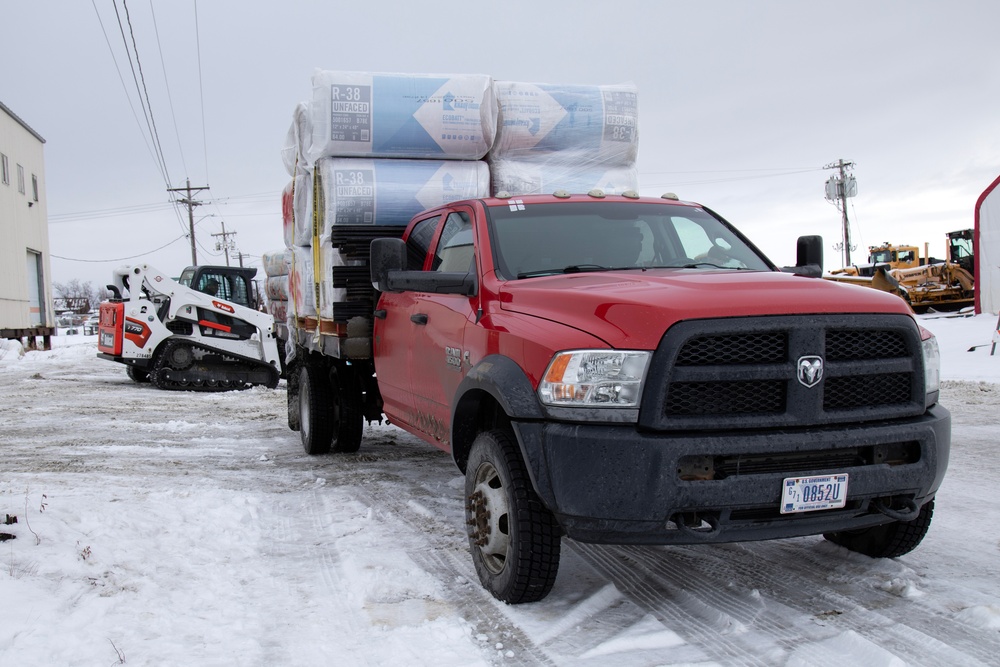 AKOM members distribute building supplies during Operation Halong Response