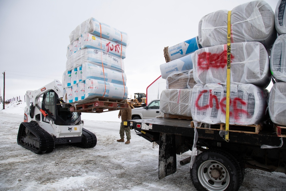 AKOM members distribute building supplies during Operation Halong Response